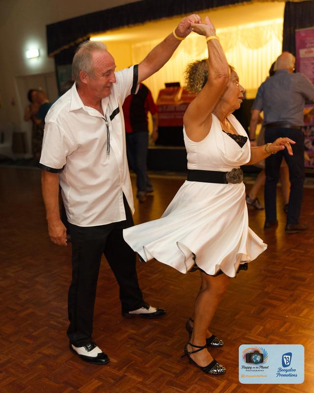 A white dress spin under the lights