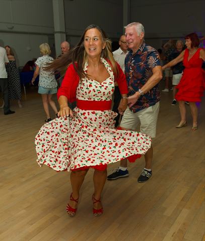 Couple jiving, her skirt flying